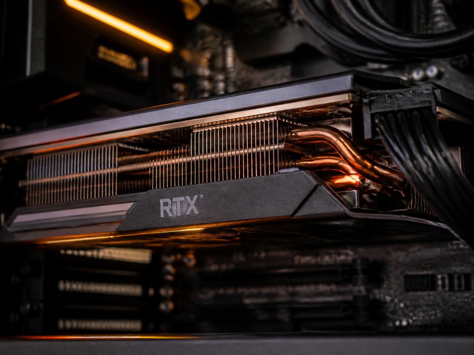 Detailed close-up of an OSHKO workstation internals — GPU heatsink and copper heat pipes